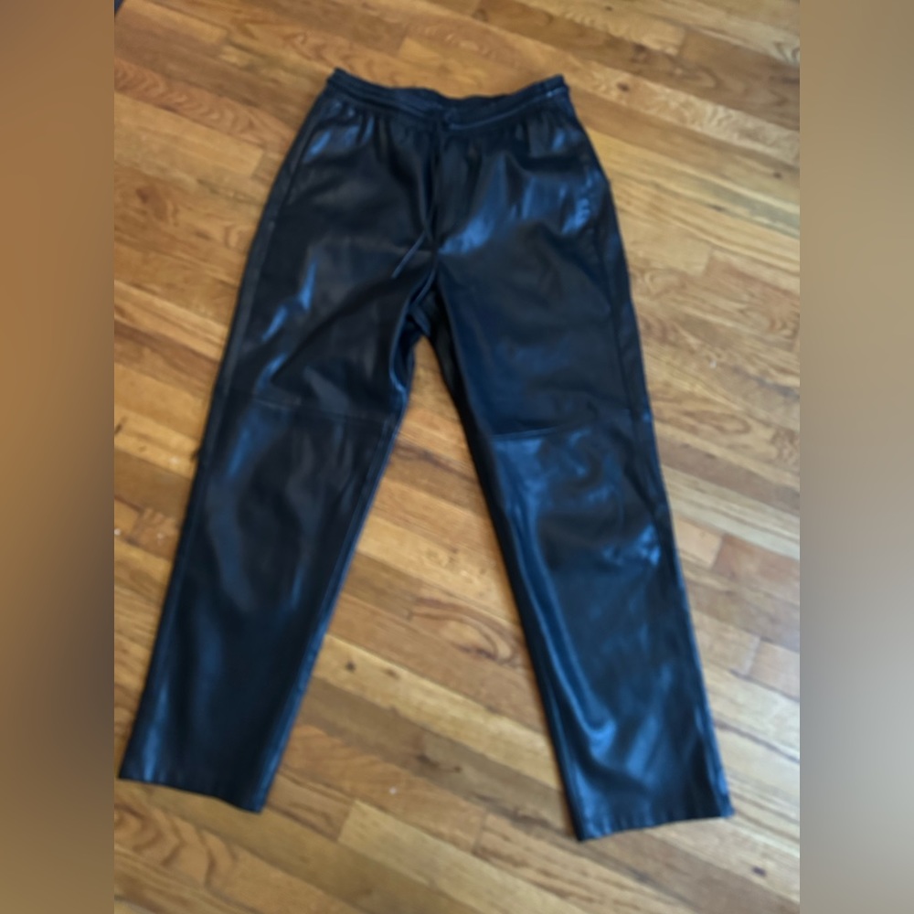 Leather pants with draw string. Mid rise. Great condition